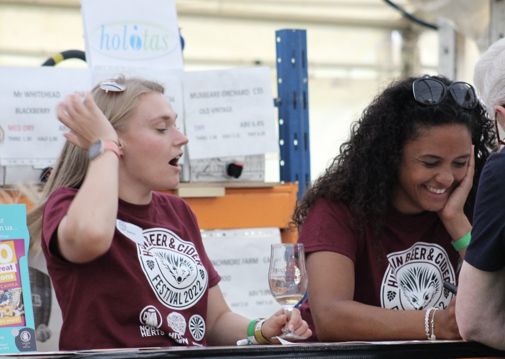 It's great to be back: Hitchin Beer and Cider Festival returns to acclaim. PICTURE: Two volunteers share a joke. CREDIT: Phil Dickson-Earle