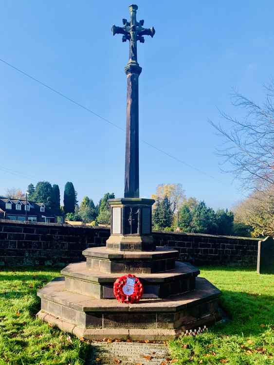 St Laurence War Memorial, with a wreath from Frodsham Manor House School