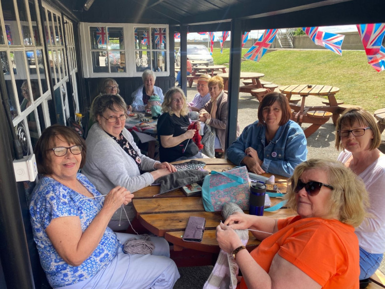 Knitters and chatters at The Wharf. 