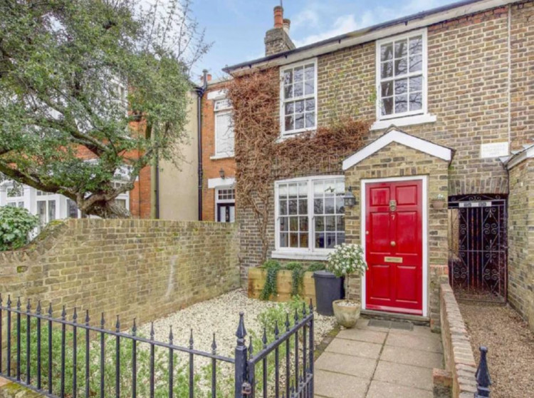 A period home, exquisitely modernised and overlooking Twickenham Green, is on the market for £875,000.