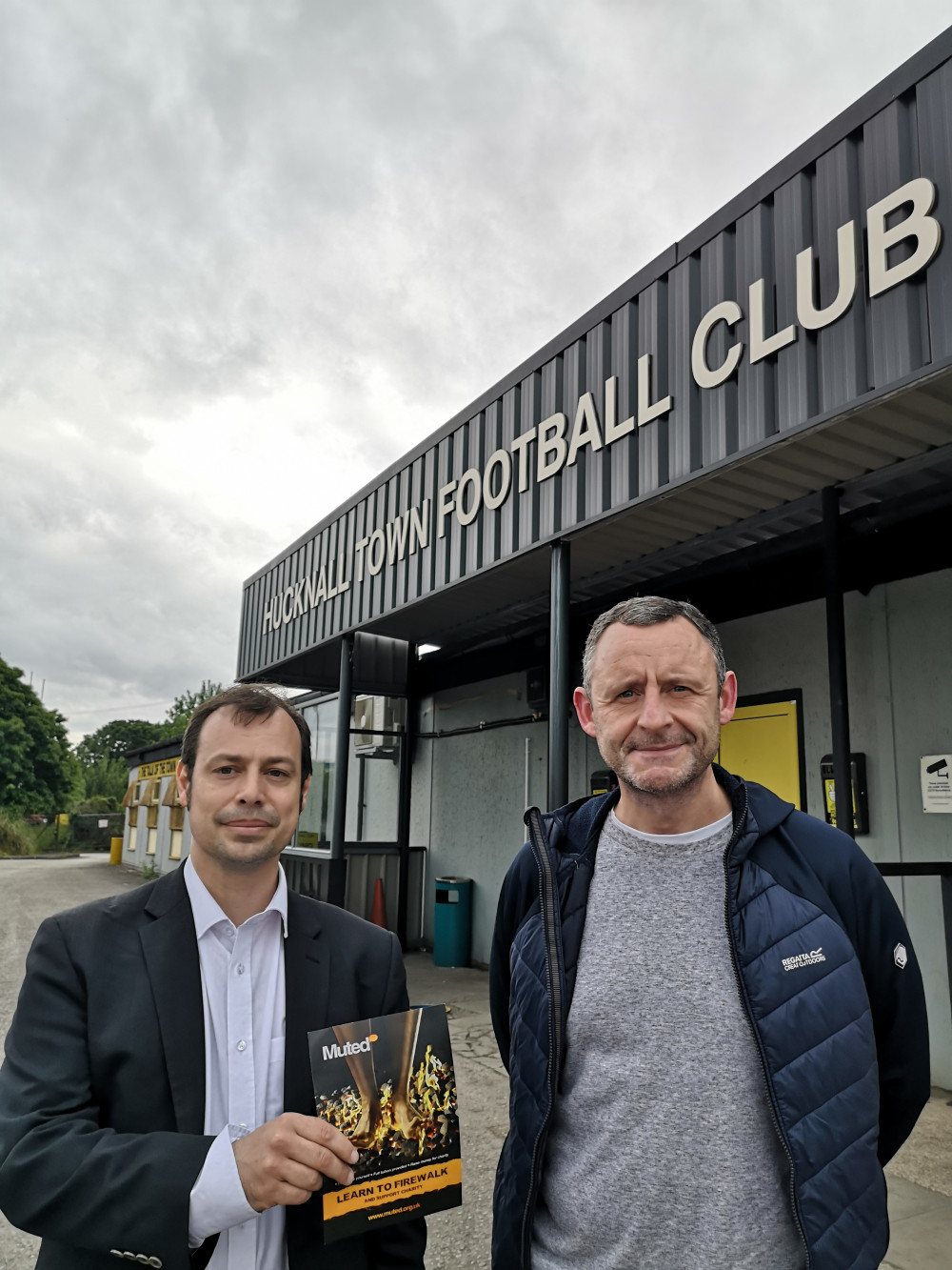 Councillor Waters (pictured, left) is set to take part in a charity fire walk this week to raise awareness of mental health issues and to encourage those affected to seek help and support. Pictured: Cllr Waters and Ian Hastings of Muted. Photo courtesy of Ashfield Independents. 