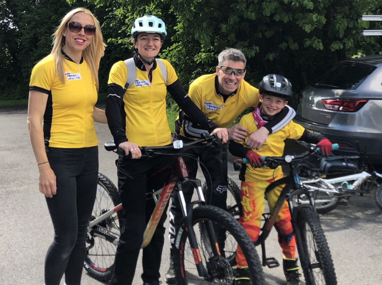 Connor Murray (right) raised £2382 for local cystic fibrosis hospital units, by cycling during the half-term. (Image - The Murray Family)