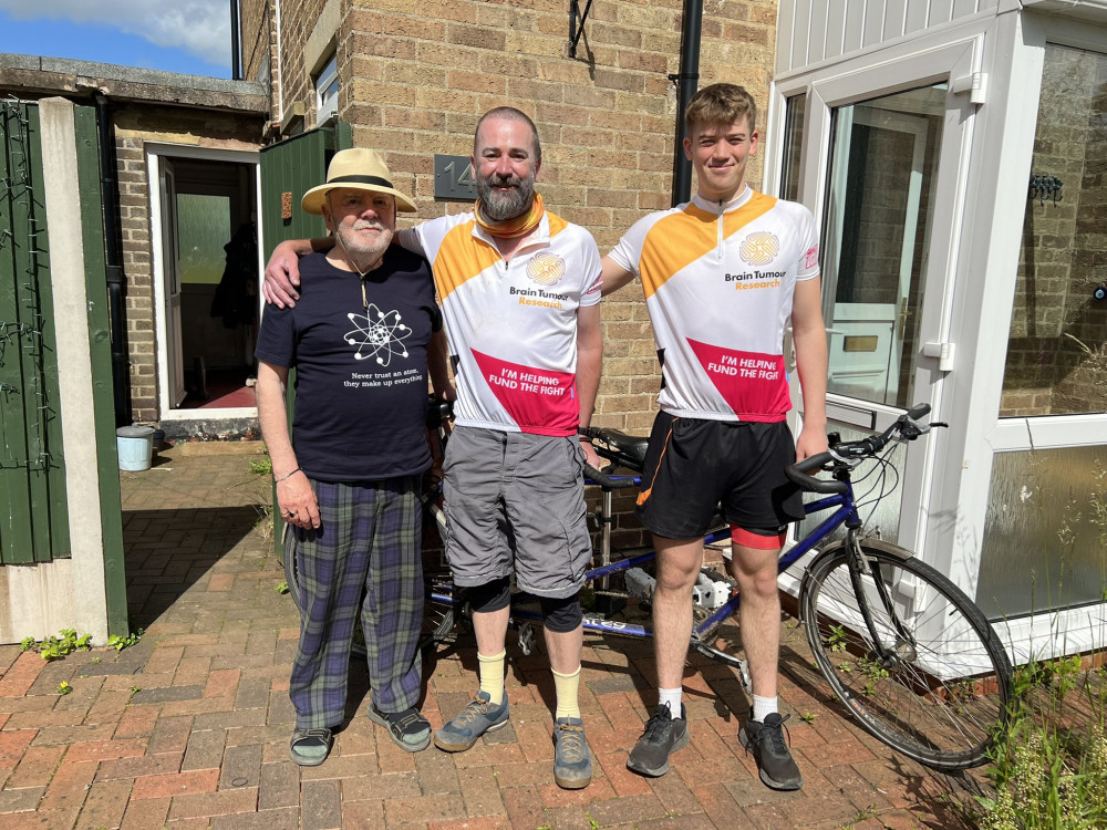 Bollington-based man Liam Bergin (centre) has cycled to his hometown of Stafford to see his dad, and raise money for a national Brain Tumour Charity. (Image - Liam Bergin / @liamdbergin Twitter)