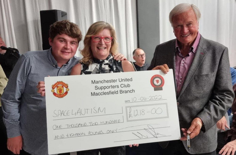 Macclesfield: Cheryl Simpson MBE (Centre) and Ron Atkinson (right) are all smiles as Macclesfield Manchester United fans helped raise £1218 for charity. (Image - Manchester United Supporters Club - Macclesfield Branch)