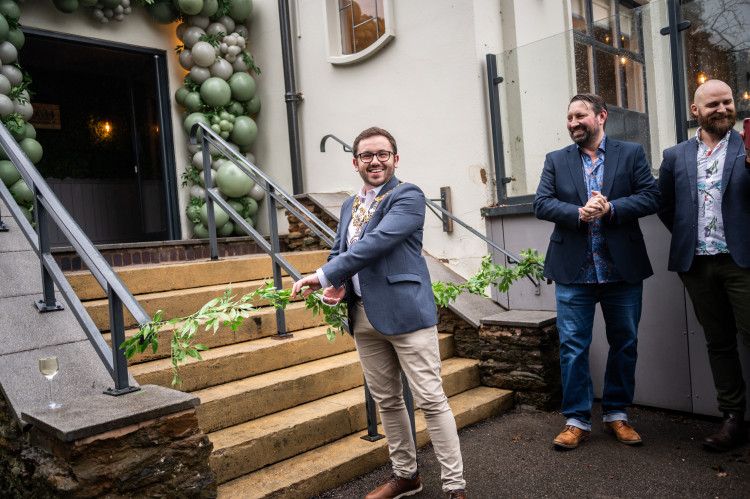 Cllr Richard Edgington snapped opening No.34 Garden and Grill on Stratford Road this March