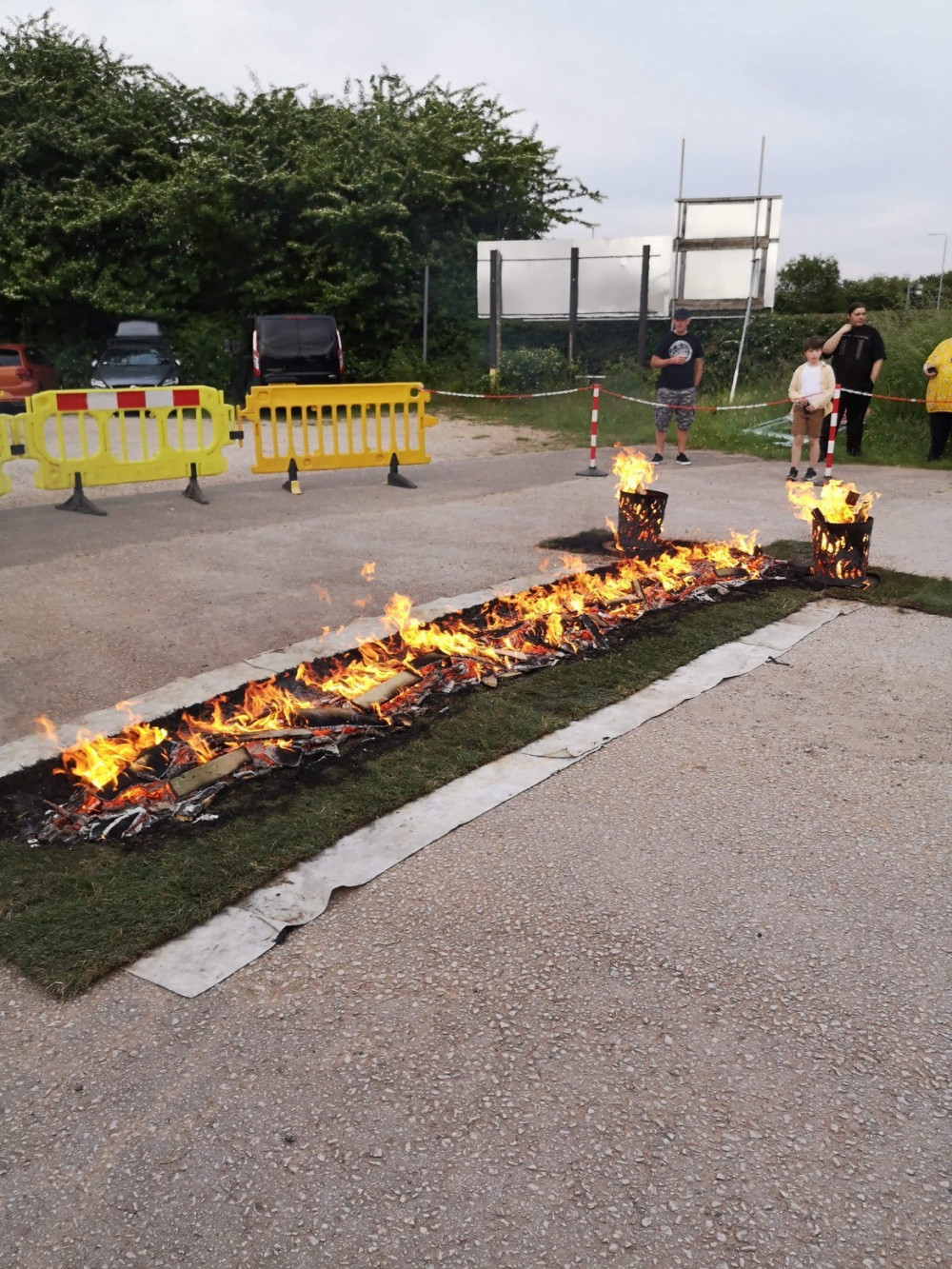 A charity fire walk that took place in Hucknall last night (Thursday 16 June) has been hailed as their most successful event ever by organisers ‘Muted’. Photo courtesy of Ashfield Independents.