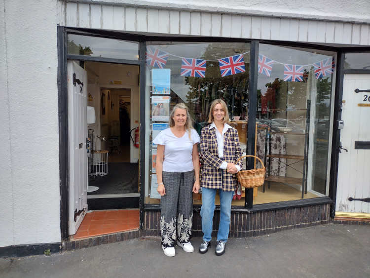 Charity Shop Girl outside St Luke's in Sandbach with shop manager Julie Middlehurst. Charity Shop Girl outside St Luke's in Sandbach with shop manager Julie Middlehurst.