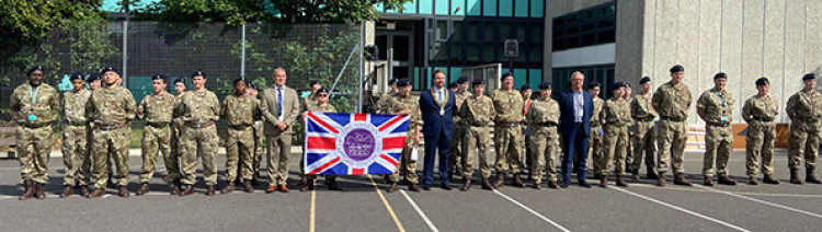 Cllrs James Halden and Barry Johnson on parade with the cadets and head Ceri Evans. 