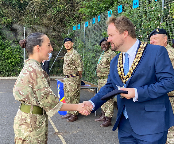 Cadet Cox receives her award.