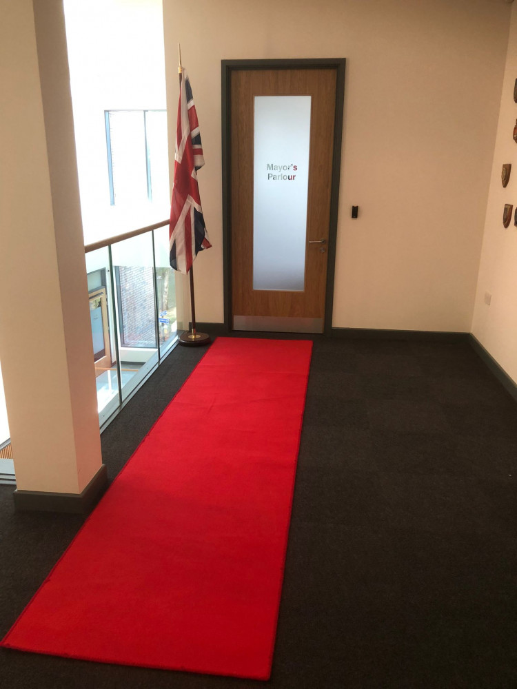 The red carpet offers an impressive welcome to the Mayor's Parlour.