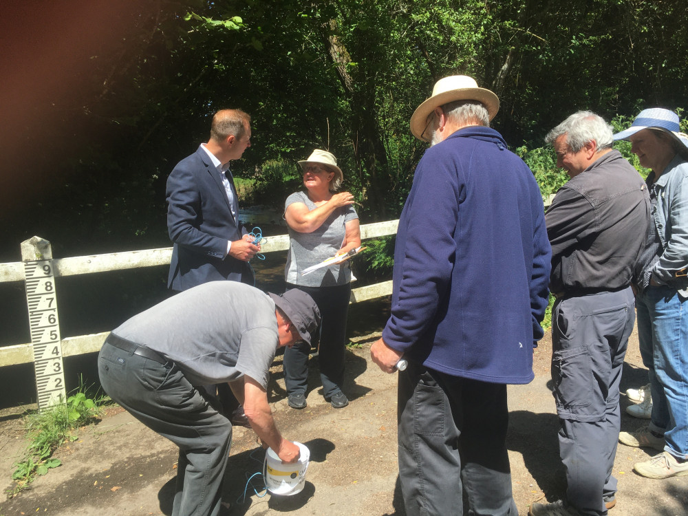 Liberal Democrat candidate Richard Foord chats to volunteers from Chardstock Eco Group