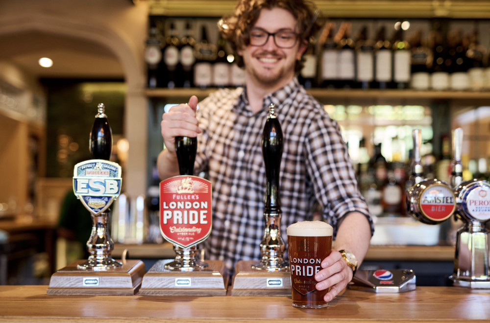 Free Beer: Pub offers Hitchin commuters a drink on the house during National Rail Strike. CREDIT: Fullers