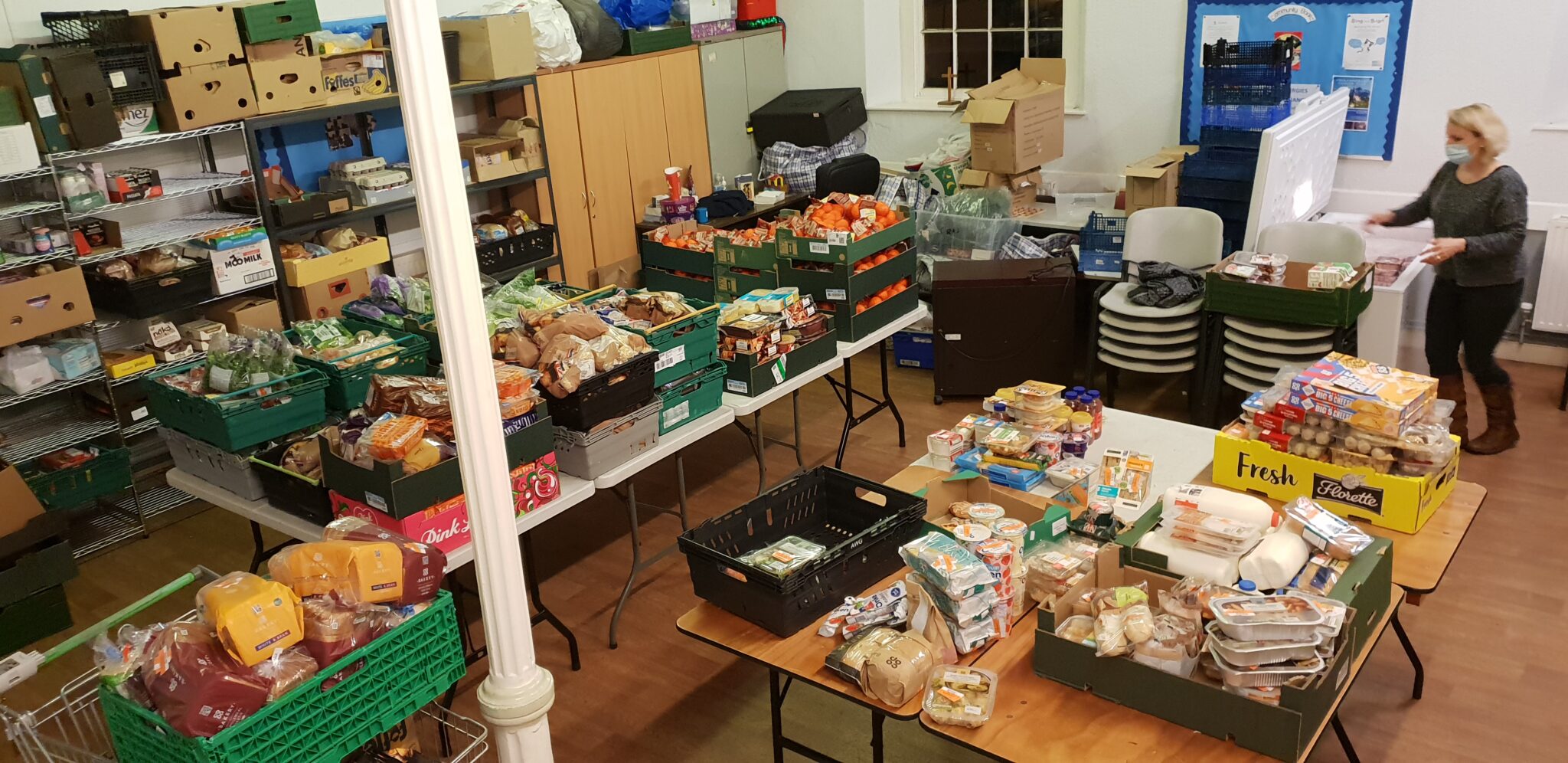 Foodsave volunteers sorting through the food. (Credit: Foodsave)