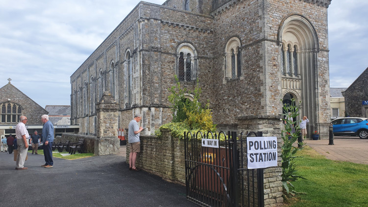 Voters outside St Paul's Church and Mackarness Hall