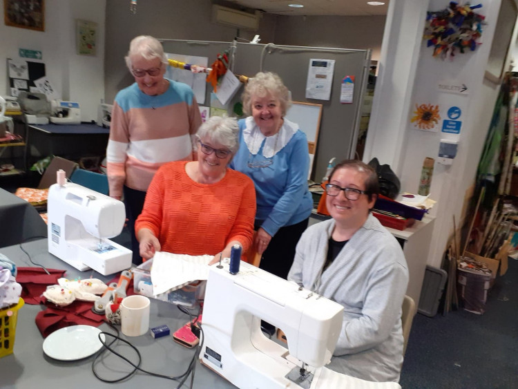 Sewing teacher, Julie Pearce (front left) with some of her students 