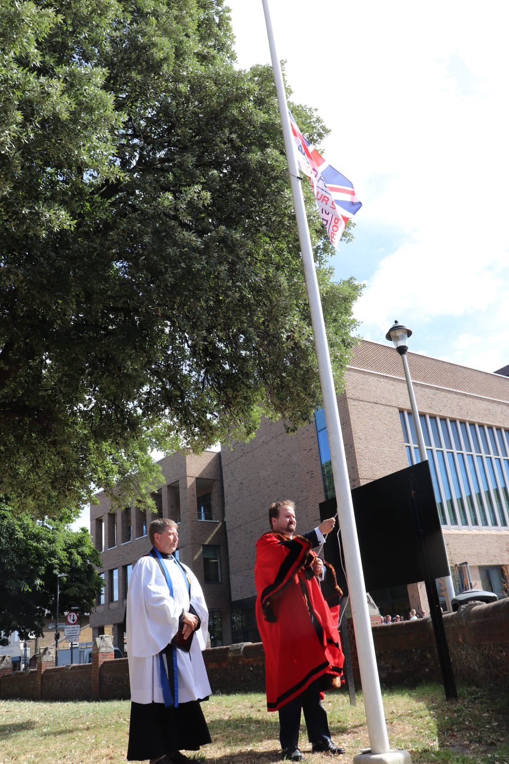 Mayor Cllr James Halden raised the flag.