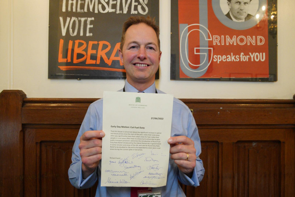 Richard Foord MP in Parliament with his letter calling for a cut in fuel duty for rural drivers. (Credit: Lib Dems)