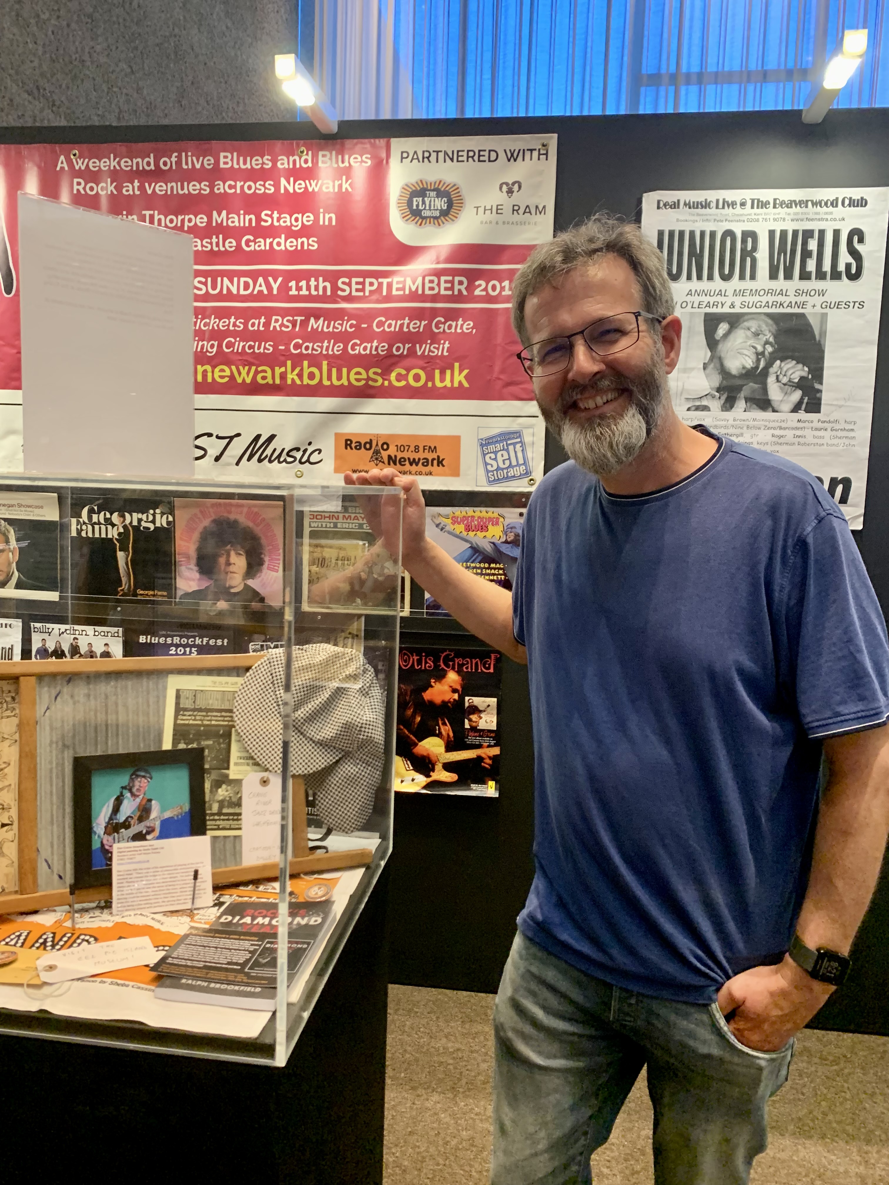 Alistair Young, co Director of The Ealing Club, at the British Blues Exhibition with Don Craine exhibit