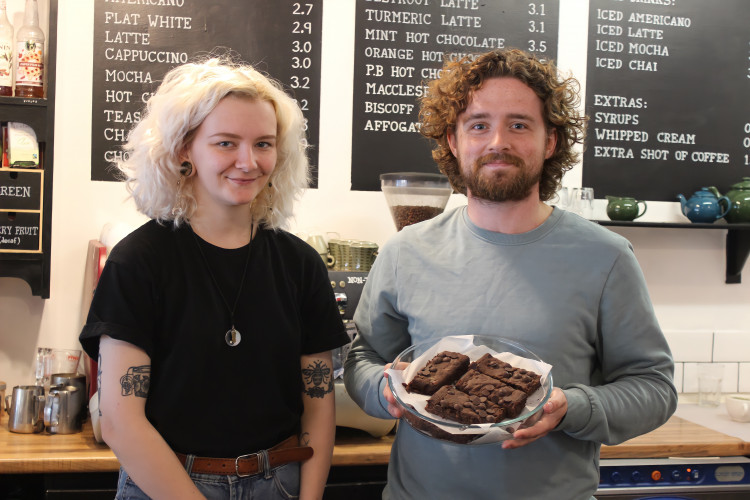 A Macclesfield lad and his best friend have taken over a Chestergate cafe. Congratulations Jim (right) and Monocle (left)! (Image - Alexander Greensmith / Macclesfield Nub News)