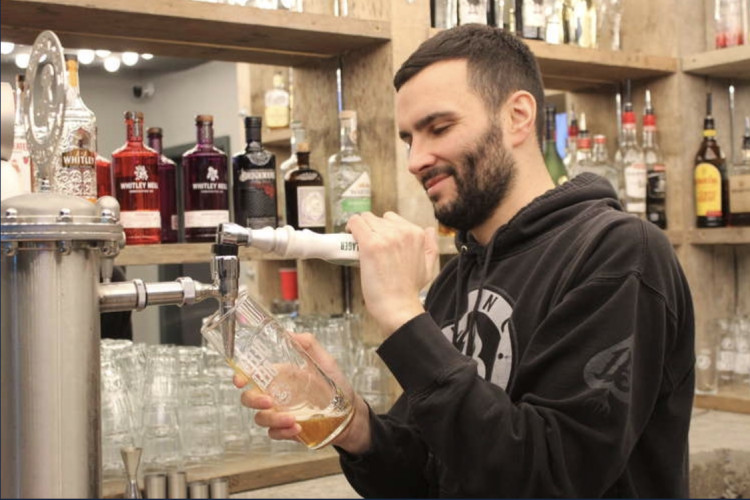 Macclesfield man David Spruce co-owns a bar which has raised money for local grassroots football. (Image - Alexander Greensmith / Macclesfield Nub News)