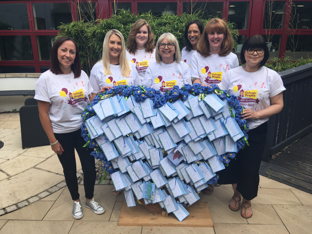 The Farleigh team with the heart of Forget-me-Not messages: Diane Meah, Hannah Tomsett, Lois Matthams, Pauline Harvey-Jones, Sabrina Rees-Evans, Michelle Martin and Claire Smith