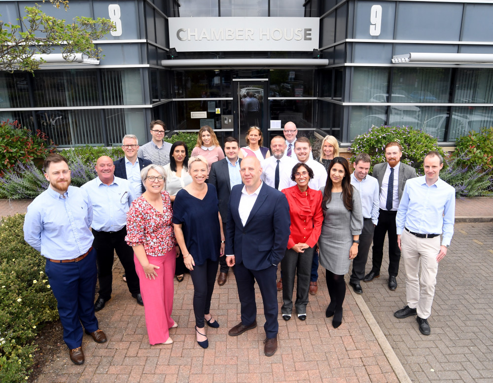 Corin Crane, front and centre, with members of the team at the Coventry and Warwickshire Chamber of Commerce (image supplied)