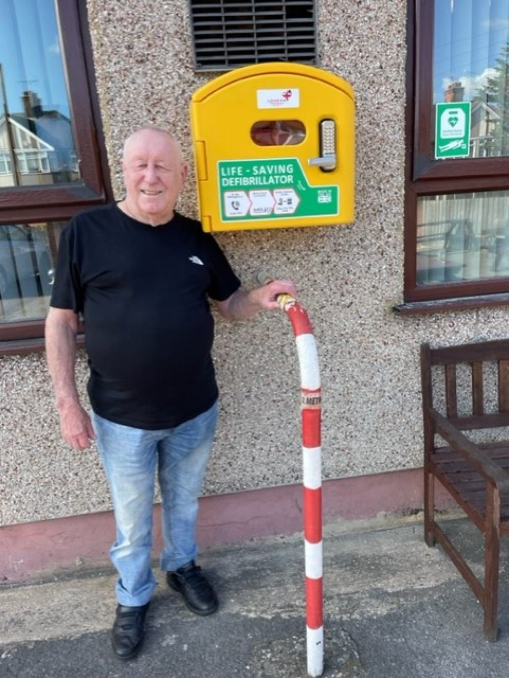 Dan Wakefield with the defibrillator outside the club.