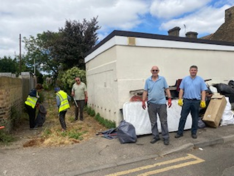 Steve Catchpole and John kent with volunteers cleaning up alleys today. 