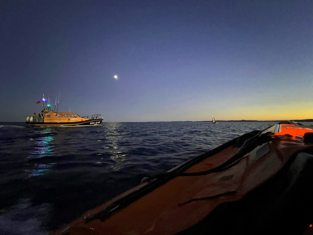 Both Exmouth RNLI Lifeboats assist the becalmed yacht. Credit: Ed Thomas / RNLI