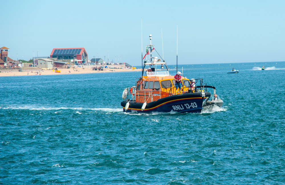 Exmouth All Weather Lifeboat 13-03 R & J Welburn brings the boat to safety (John Thorogood / RNLI)