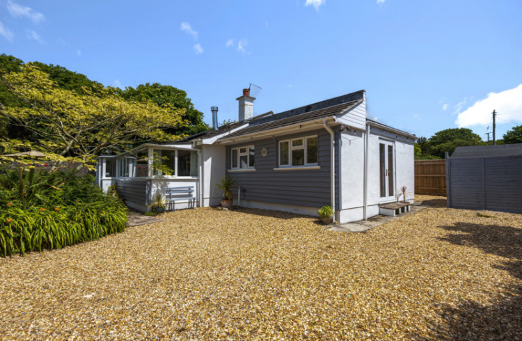 See this four bed bungalow in Helston from Bradleys Estate Agents.