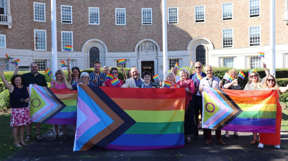 Members of the County Council’s Executive, staff, and organisers of Taunton Live and Pride outside County Hall