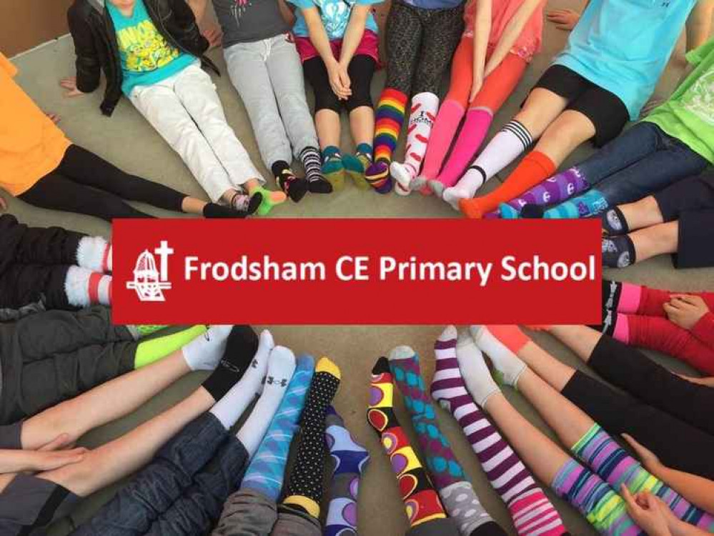 Frodsham CE pupils wore odd socks to show that we are all unique. Background image: Anti-Bullying Alliance