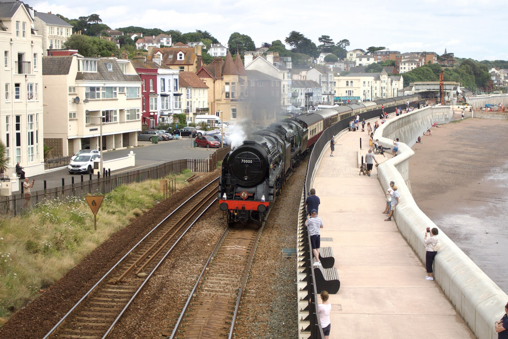 No. 70000 ‘Britannia’ with No. 34046 ‘Braunton’ behind passing through Dawlish (Nub News, Will Goddard)