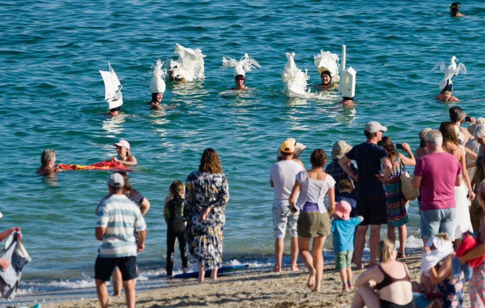 Mad hatters on Gylly Beach Falmouth. Steve Tanner.