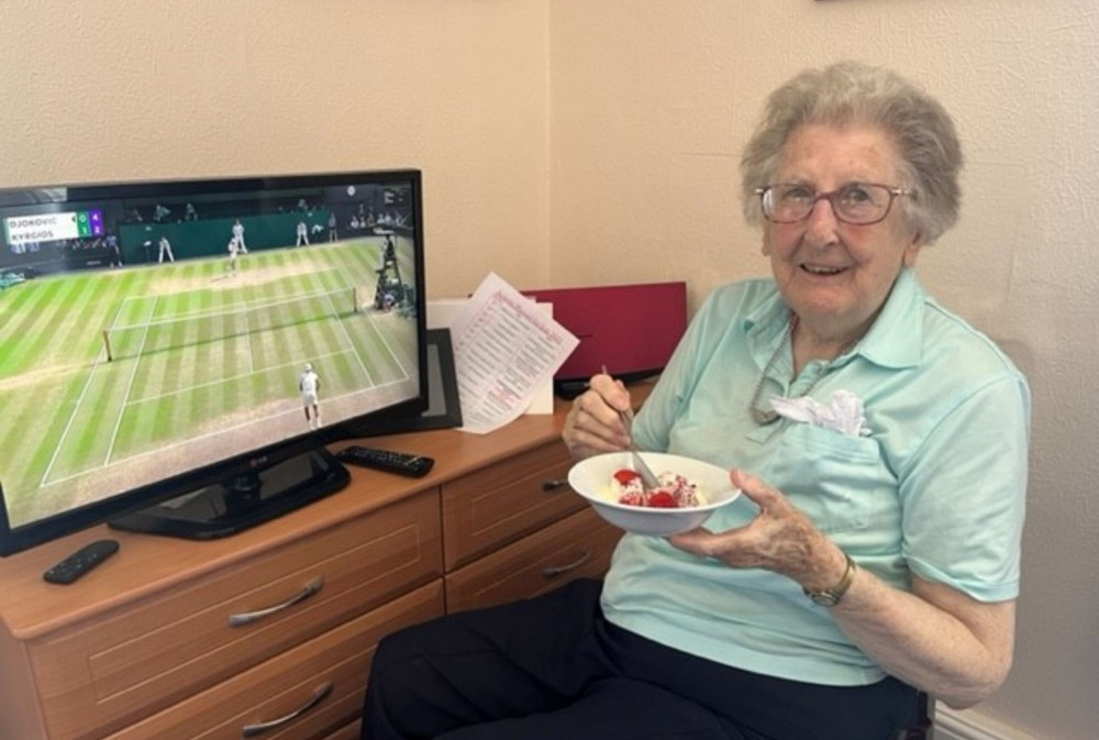 Gwen eating her strawberries whist watching Wimbledon (Doveleigh Care)