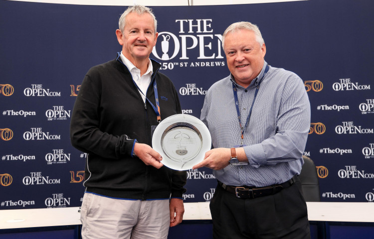 Derek Lawrenson, left, was presented with an award from the Association of Golf Writers