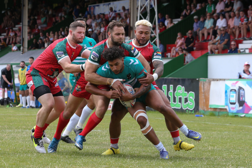 Decarlo Trerise is forced back by the Keighley defence – Touchlinepics.