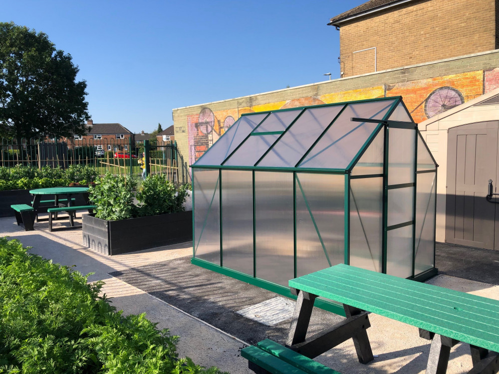 The greenhouse which was assembled by North West Leicestershire's housing team and the finished project. All Photos: NWLDC