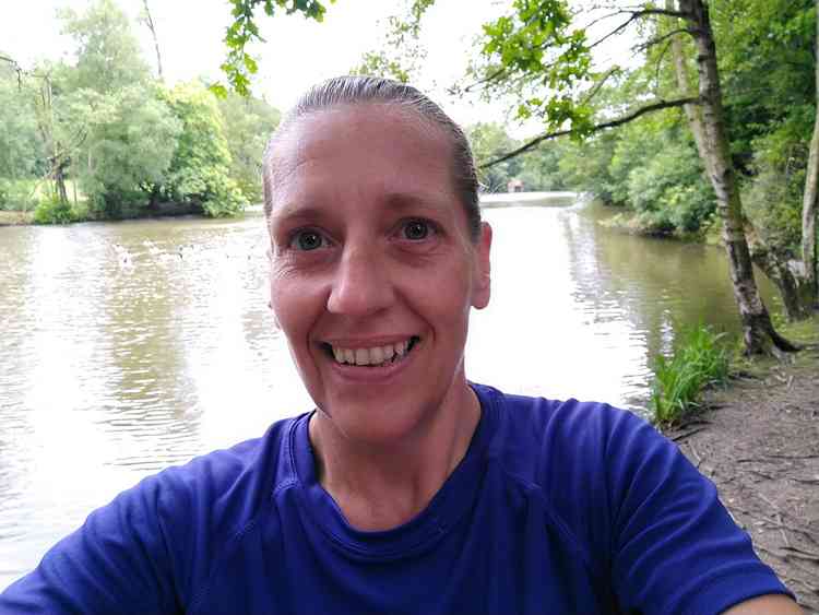 Rachel Platt runs round a Lake at Biddulph Grange