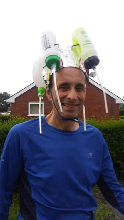 Jon Horne poses in his home made running hat