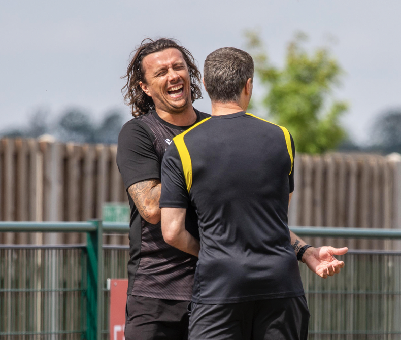 Pals together: Mark Burke and Brett Donnelly get each other before the game. CREDIT: PETER ELSE 