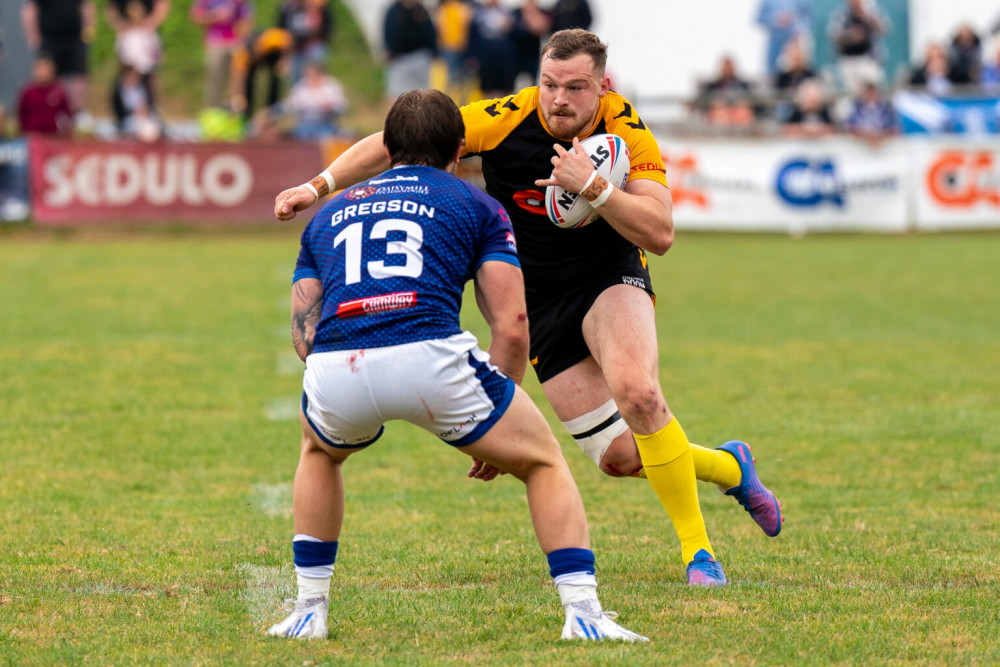 Cornwall’s Tom Ashton runs at Swinton loose forward Nick Gregson – Patrick Tod.