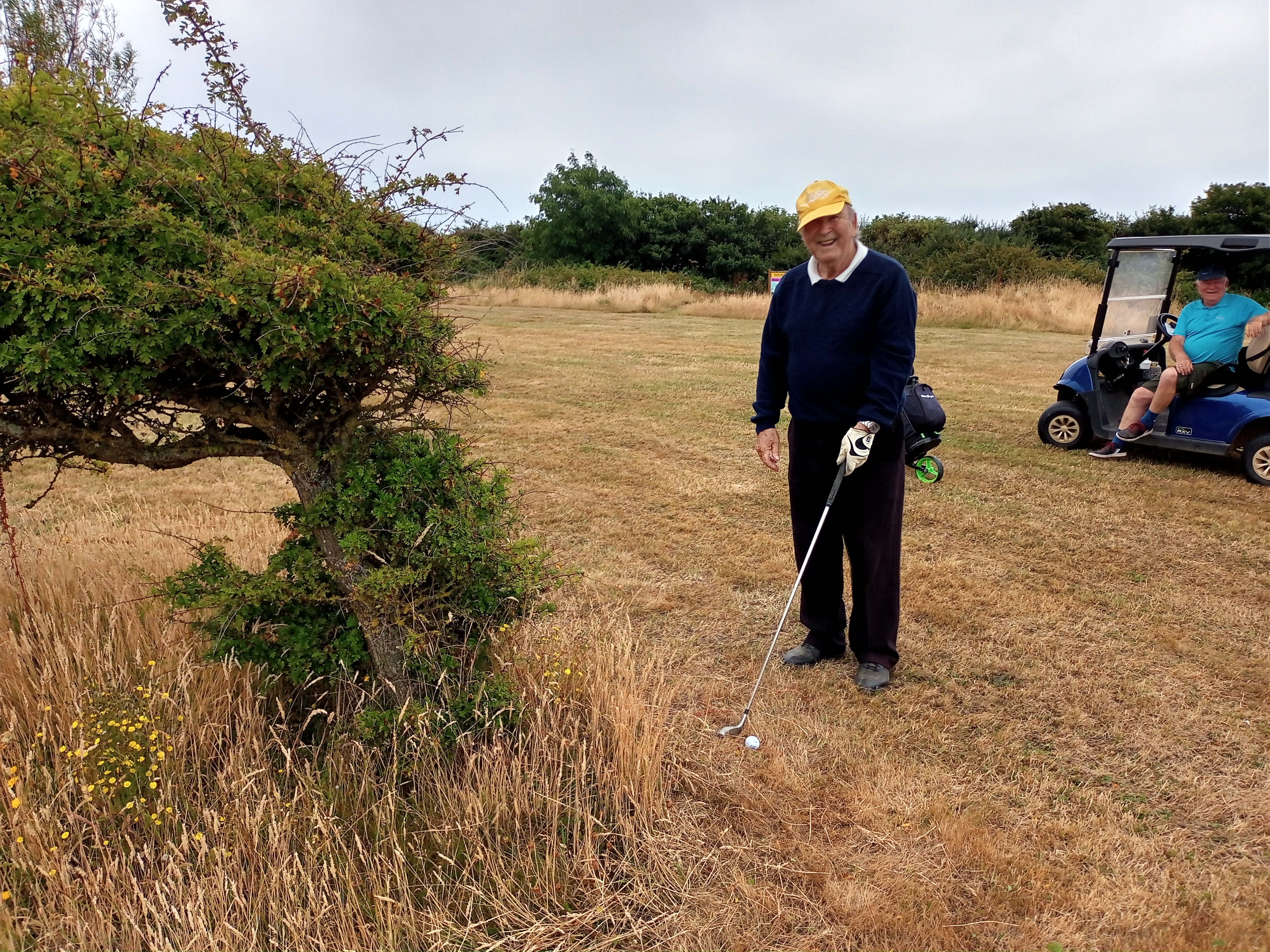 Geoff Hughes managed to get his ball to of the bush and onto the fairway - but only just!!