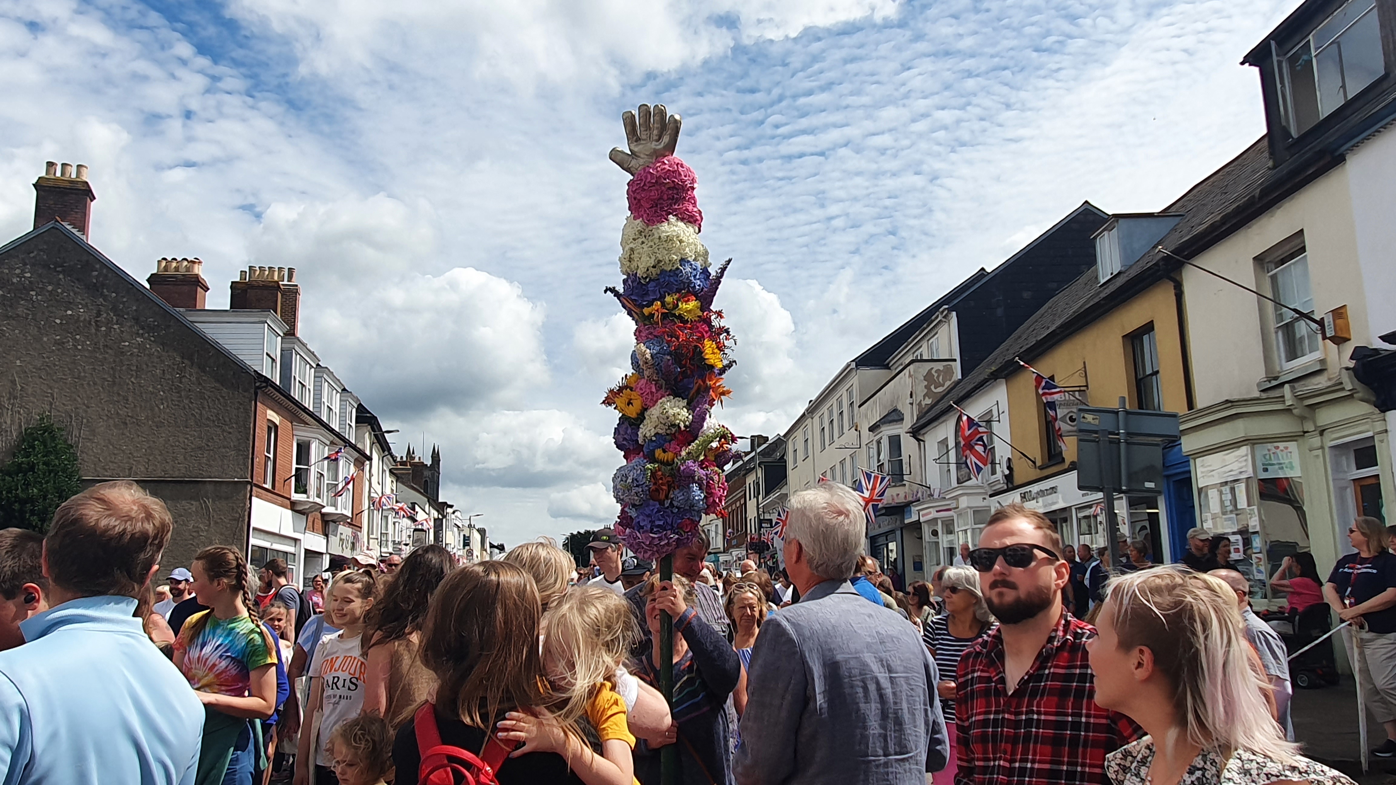 The garlanded pole, which was lifted by Town Crier Dave Retter