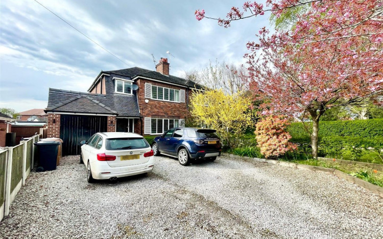 This stylish house is for sale in Abbey Road, Sandbach. 