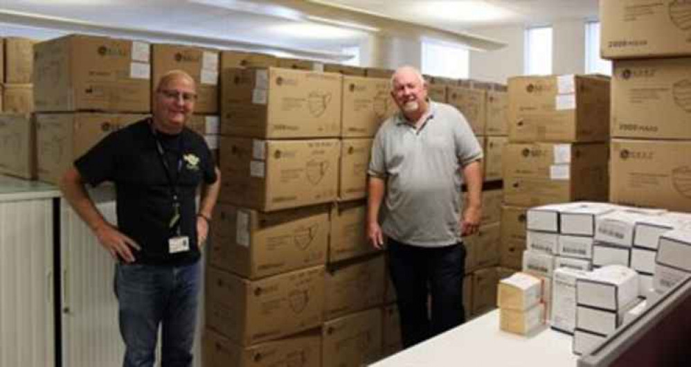 Staffordshire County Council staff John Challinor and Paul Forrester packing and delivering PPE for frontline staff in Staffordshire.