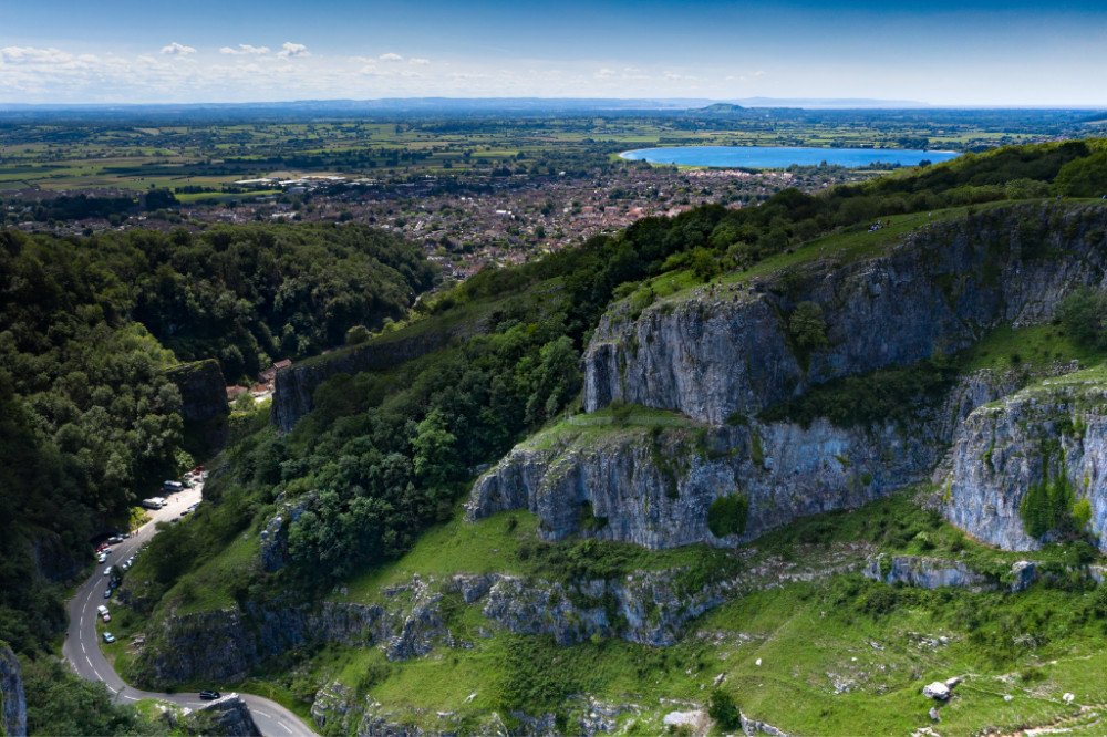 A landscape view of Cheddar with the Somerset Levels in the distance