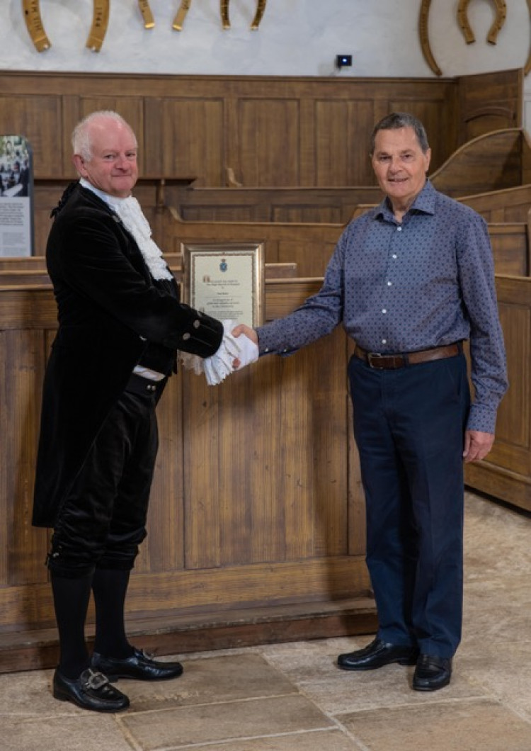 Paul receiving his award from the High Sheriff of Rutland