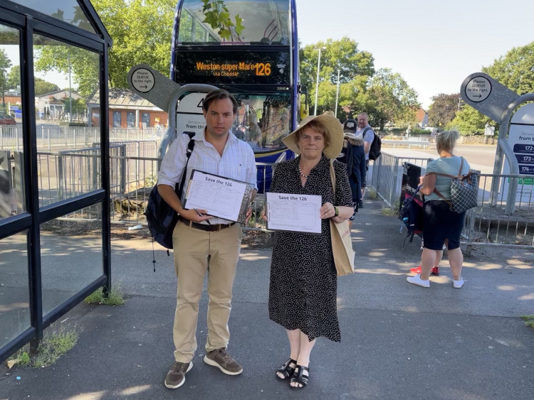 Cllr Theo Butt Philip and Cllr Ros Wyke collecting signatures at Wells Bus Station